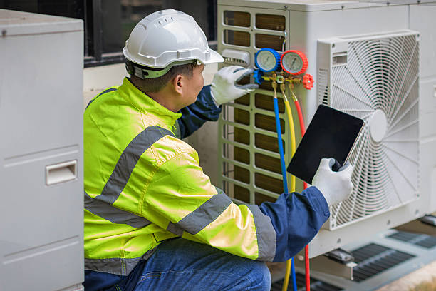 Professional Heat Pump Repair technician working in Springfield, TN